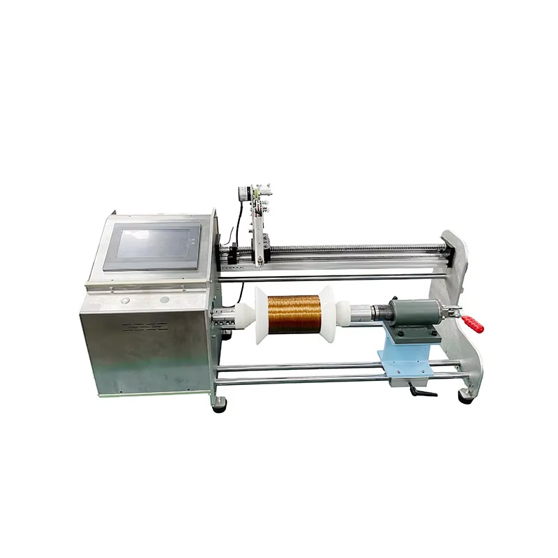 Large coil winding machine with motor tailstock and fixed shaft